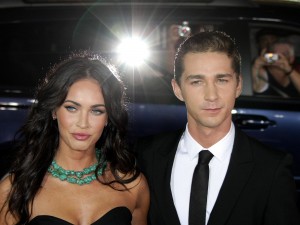 Shia LaBeouf and Megan Fox hold hands and pose with one another