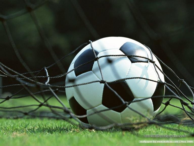 Niños a practicar fútbol