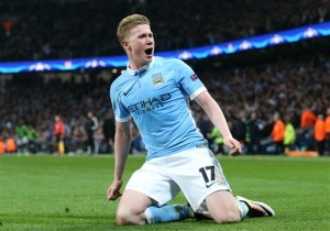 Manchester City's Kevin De Bruyne celebrates scoring his side's first goal of the game, during the Champions League Quarter Final, Second Leg soccer match between Manchester City and Paris Saint-Germain, at the Etihad Stadium, in Manchester, England, Tuesday April 12, 2016. (Martin Rickett/PA via AP) UNITED KINGDOM OUT NO SALES NO ARCHIVE