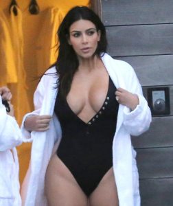 Photo © 2016 Splash News/The Grosby Group EXCLUSIVE Iceland, April 29, 2016. Kim Kardashian celebrates a day after Kourtney's 37th birthday at the Blue Lagoon with her friends as they all took a VIP dip in the blue and white water. Kim held a glass in her hand as she and the group including Jonathan Cheban, Simon Huck, and Stephanie Sheppard (Kim's assistant) all shared some laughs at the swim up bar as the TV crew filmed them on their last night in Iceland. Kanye West was all smiles also as he watched Kim from the side of the swimming area. Kim was showing off her curves in a low cut swimsuit as she posed for her camera phone with her assistant Stephanie as they took her photos while Kim's body was getting wet. The group watched as Jonathan Cheban had a white mask facial and swam around the lagoon into the night. The lagoon was closed off at 8:30pm for the regular guests, as Kourtney's birthday celebration was able to be the only guests allowed in the water where they happily stayed until 11pm.