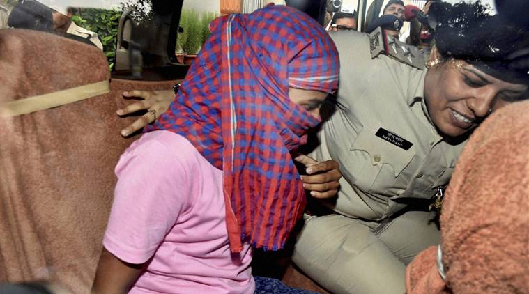 Patna: Police arrest Ruby Rai, victim of Bihar School Examination Board higher secondary exam topper scam in Patna on Saturday. PTI Photo (PTI6_25_2016_000122A)