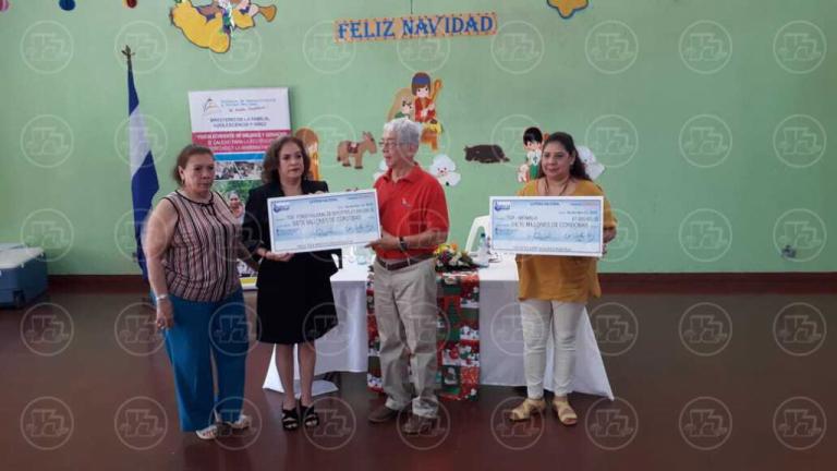 Lotería Nacional entrega 14 millones de córdobas a MiFamilia y IND
