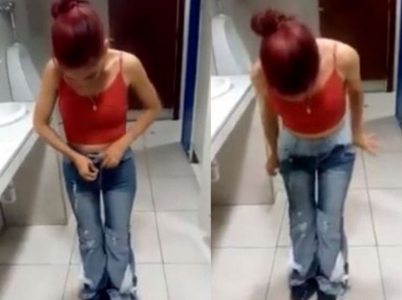 Mujer robando 9 pantalones